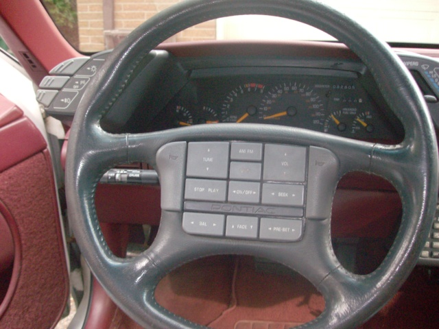 Pontiac Repair: getting to turn signal switch on a 1992 grand prix se with radio controls on steering wheel., screw driver, signal switch