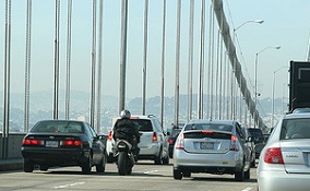 A motorcycle lane-splitting