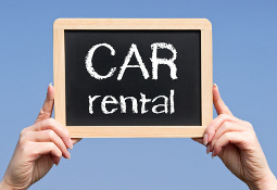 Mini-chalkboard with "Car Rental" written on it