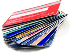 Stack of credit cards on white background