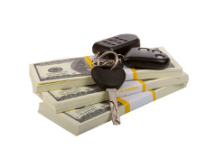 Car keys on money stack