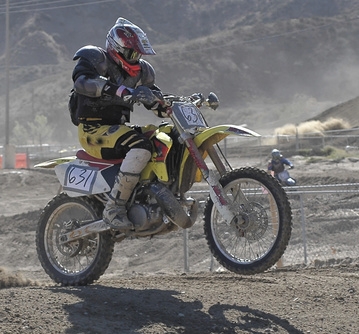 How to Drive a Motorcycle With the Front Wheel in the Air
