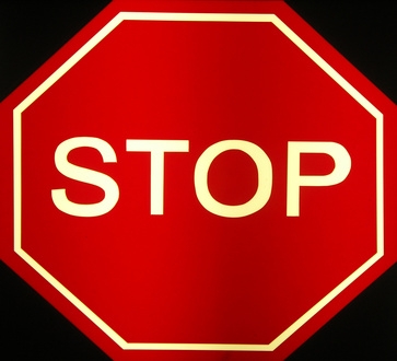 How to Stop at a Three-Way Stop Sign
