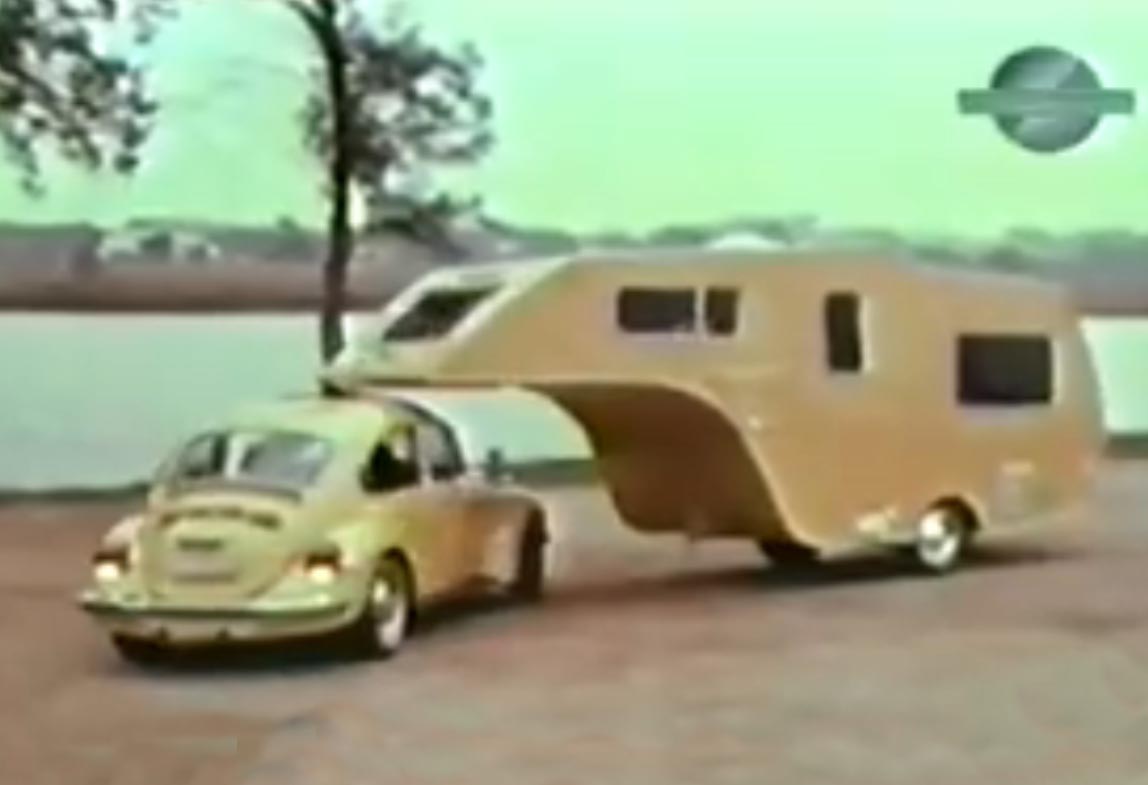 Vintage 5th Wheel Travel Trailer Towed by a VW Bug