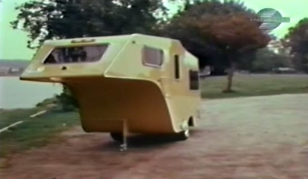 Vintage 5th Wheel Travel Trailer Towed by a VW Bug