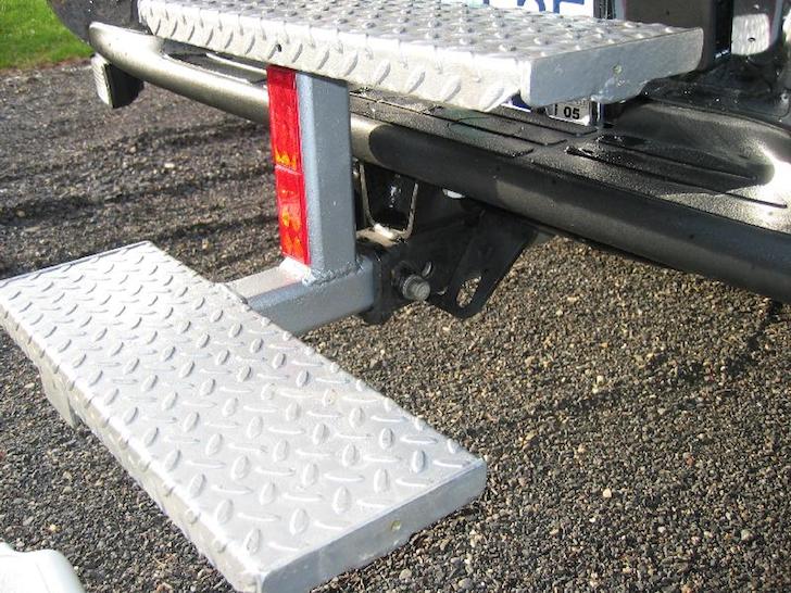 Close-up-view-of-DIY-steps-on-a-Lance-truck-camper
