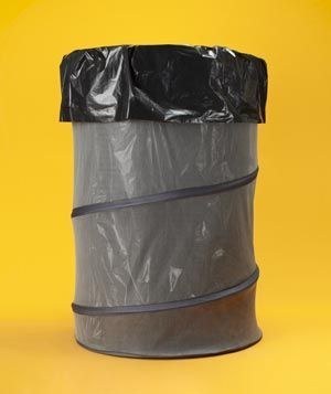 a collapsible laundry basket makes a great trash can at any campsite