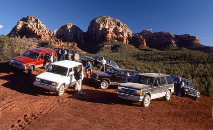 1991 Ford Explorer Eddie Bauer vs. GMC S-15 Jimmy SLX, Isuzu Trooper LS, Jeep Cherokee Laredo, Mitusbishi Montero LS, Nissan Pathfinder SE, and Toyota 4Runner SR5