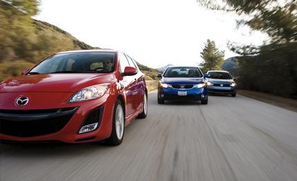 2010 Kia Forte SX vs. 2010 Mazda 3 s Sport, 2010 Volkswagen Golf