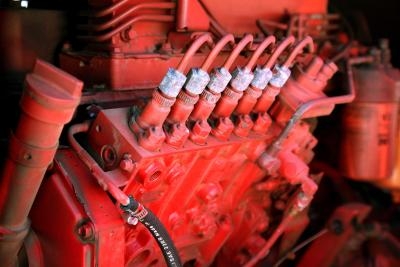 Where Are the Spark Plugs Located on a 54 L Ford Engine?