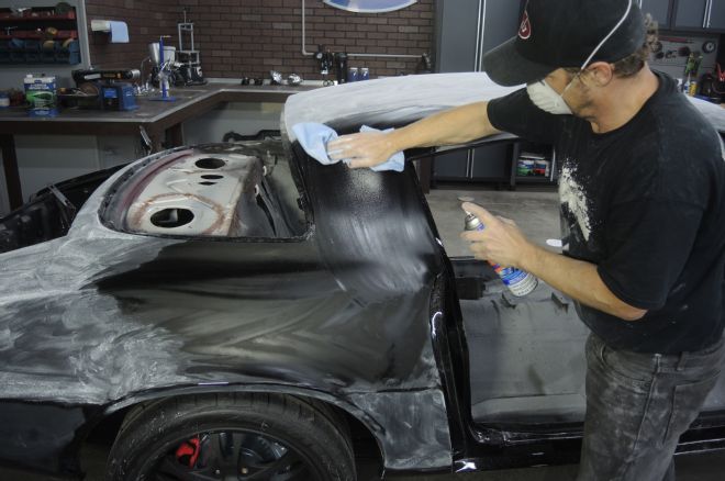 1978 Chevrolet Camaro Z28 Using Spray Glass Cleaner To Lift Dust