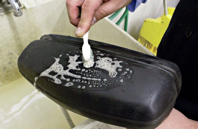 Headrest Cleaning Vinyl With Dish Soap Water And Toothbrush