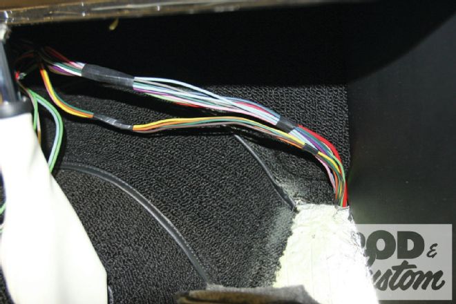Wiring Routed Through Hole In Passenger Footwell
