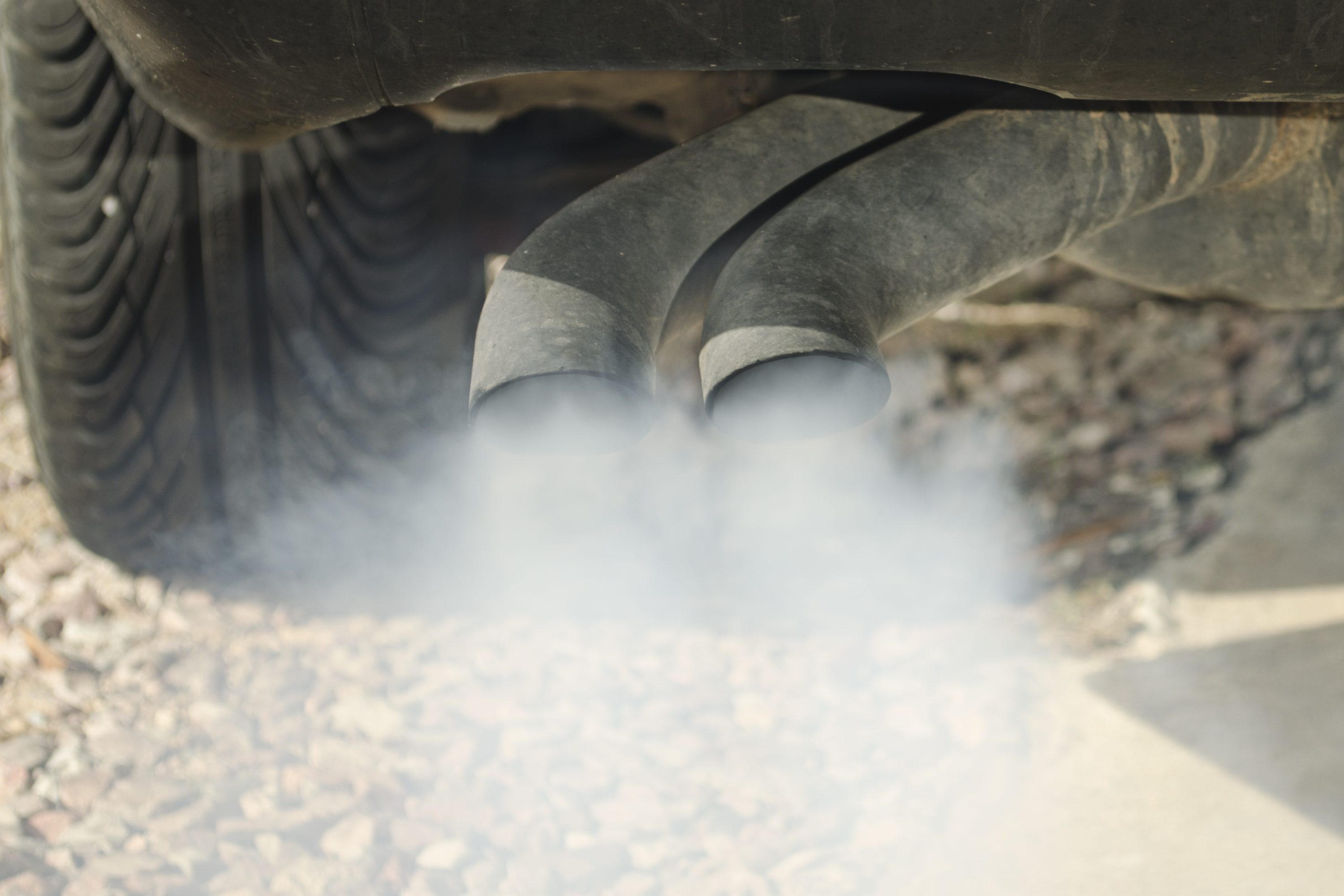 Water & White Smoke Coming Out of the Tail Pipes