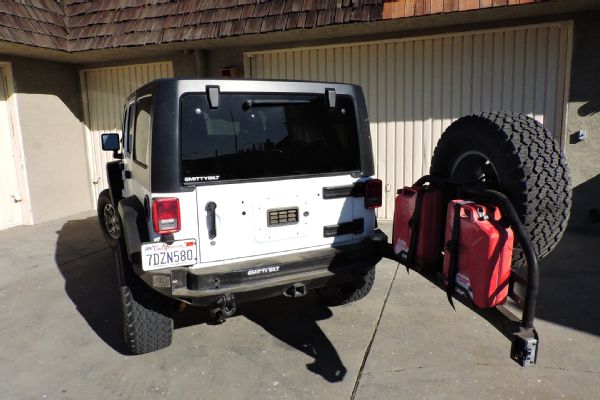 23 Smittybilt Tire Carrier Jk Wrangler Four Door Five Months Use Photo 168892664