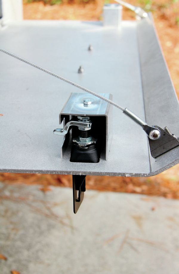 The Trailgate uses a twin cable system to keep it resting flat when open. To secure it to the tub, each side gets a set of adjustable latches. The keyed latches drop into the notched hole in the gate and are easy to setup and operate.