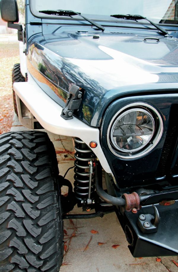 We opted for the 3-inch tapered aluminum version of the Defender Flare. This gives us a little tire coverage along with a slightly aggressive and cleaner body line. One of the more unique aspects of the flare’s construction is that it is comprised entirely of 3⁄16-inch plate aluminum. This fender design was built not only to be stronger over a conventional aftermarket fender but to retain a smoother design throughout. Replacing the turn signal and side marker light is a 3⁄4-inch round LED.
