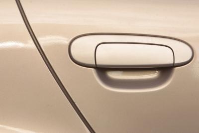 How to Adjust a Car Door