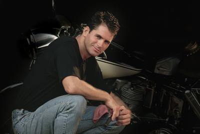 How do I Check Transmission Fluid Levels in a Sportster 883?
