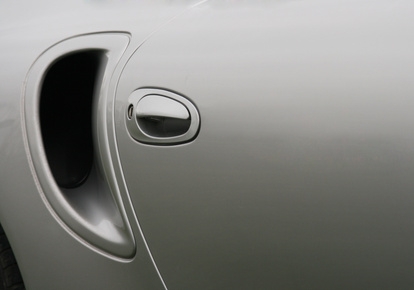 How to Reattach Rubber on an Auto Door Frame