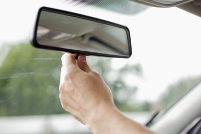 How to Glue a Rear View Mirror Back to the Windshield