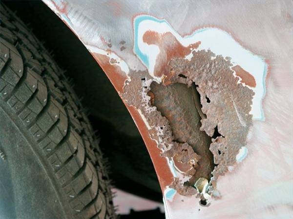 How to Repair Rust Holes Around the Wheel Well