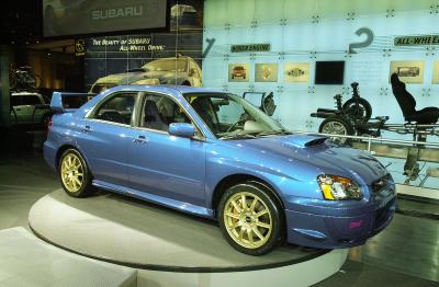 Why Do Car Lights Flash After a Battery Change in a Subaru Impreza?