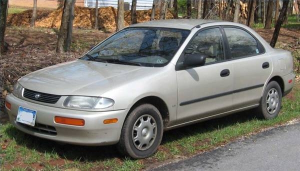 How to Install Front Struts on a Mazda Protege