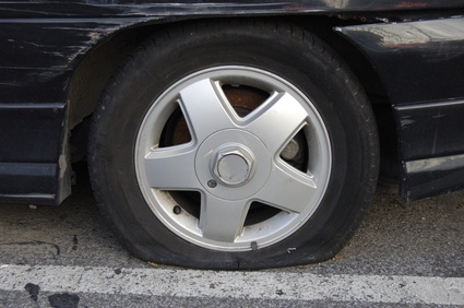 How to Remove the Lower Spare Tire From a TrailBlazer