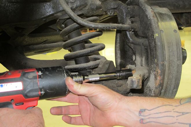 1957 Chevrolet Coupe Removing Nuts From Steering Arm