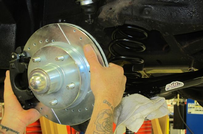 1957 Chevrolet Coupe Installing Assembled Spindle On The Upper Ball Joint