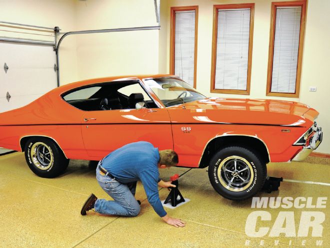 1969 Chevrolet Chevelle Ss396 Jacked Up Adjusting Shifter From Under The Car