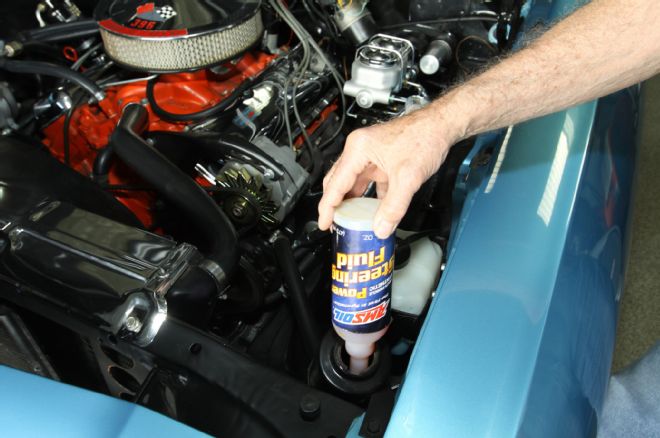 Adding Amsoil Synthetic Power Steering Fluid