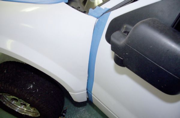 You need to be careful with the body panel gap at the door. It’s wise to open and close the door to check that the door and fender never rub. The required gap may be more than you expect. Masking tape at the panel edges offers some door paint protection when doing this.