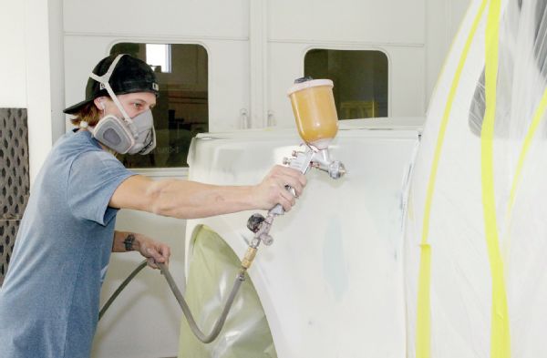 Justin shot three coats of high-build primer onto the bedsides to further help smooth the glass ripples and wavy spots. He added flex agent to the primer mix to provide a less rigid backing for the paint base. This is good practice when shooing onto fiberglass, and when it’s for an off-road application.