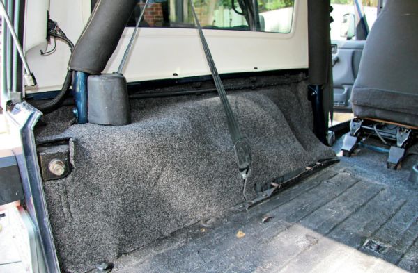 We got to guinea-pig BedRug’s new Unlimited LJ kit and were stoked that it fit without any issues. The sides of the rug install first and simply slide behind the seatbelts. All necessary notches and openings were already in place.