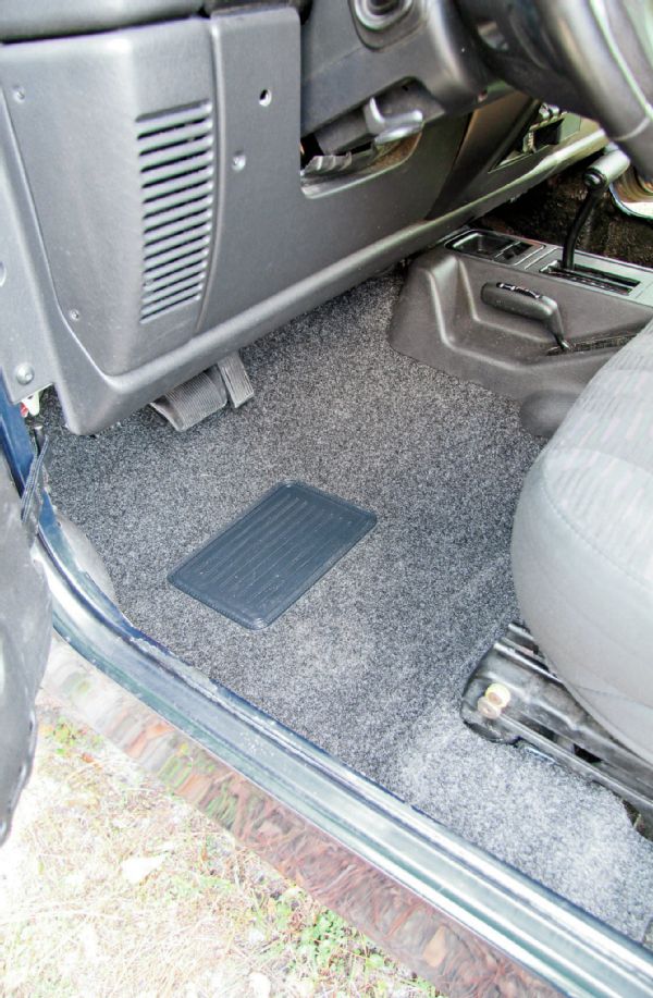 We’ve had carpet kits in the past that didn’t fit well, so we were initially skeptical at how well the BedRug would fit. After we got the kit in place, all of our fears went away. While it takes a little nudging to get it snug under the seats and center console, the end result is a stock-like fitment.