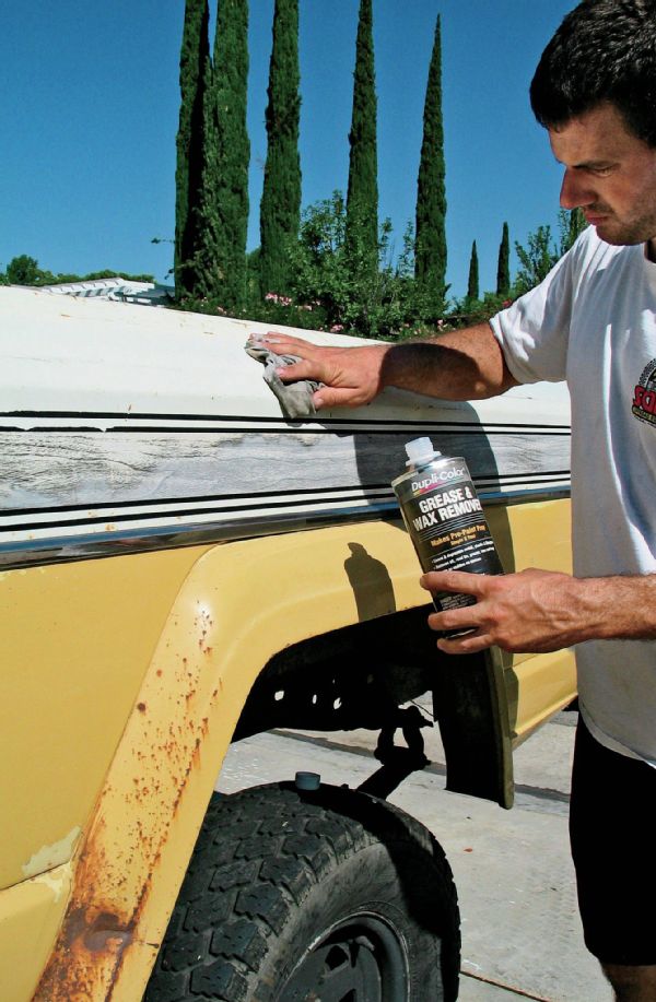 Wiping Body Down With Wax And Grease Remover Photo 70461376