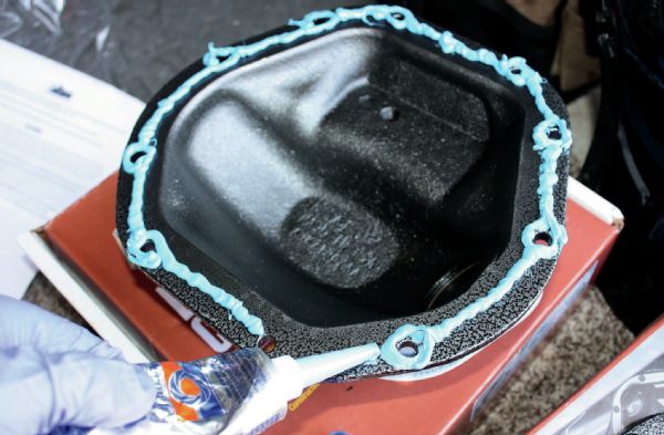 This is the most important step of the process and will ensure that your differential cover will not leak room-temperature vulcanization silicone sealant. Make sure that the face of ring-and-pinion housing is completely dry before joining the AEV differential cover to the housing or leaks will likely occur.
