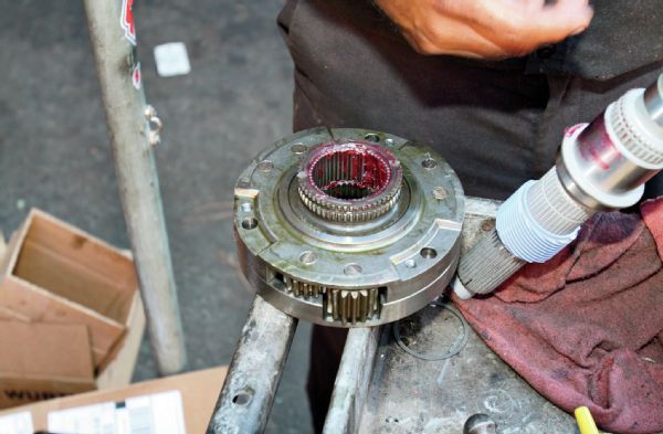 This is never fun. Unlike the NP231, the NP242 uses non-caged needle bearings on the planetary gearset. That means it is always a “fun” game to get them to stay on while putting the shaft back in the planetary set. Here, high-tack red grease was used to keep ’em in.