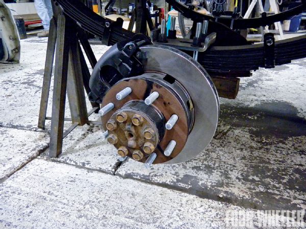 This photo shows the entire setup installed under a vehicle with new calipers installed and plumbed. Once the whole system was installed, new brake lines were installed and the system was bled.