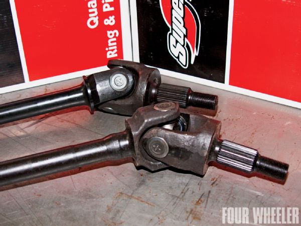 With a bulletproof set of gears and a selectable locker to match, the next rational place to focus our attention was the axleshafts. For those who want to run 35-inch-or-taller tires on a model 30 front end, we strongly suggest installing a pair of Superior's Super 30 chromoly axleshafts because they offer vast improvements in strength over stock. The OE axleshafts on the JK Dana 30 feature 27 splines whereas the Super 30 shafts come with 30 splines. Typically, each spline represents an 11-percent increase in overall strength. Combine that with the added strength of chromoly steel material, and you have a much more reliable axle arrangement for your JK.