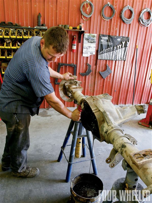 Custom Diff has the equipment to move heavy axles, so it was easy to get the unit out of the bed of our project Power Wagon and into the work area after the seven-hour trip from the Four Wheeler Midwest Bureau. Once on the stand, the first thing Patrick Naeger did was remove the cover and start disassembling the axle. Once the axle was apart, he steam cleaned the housing.