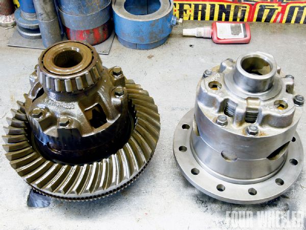 Here you can see the old factory differential assembly next to our new Ford Traction-Lok limited-slip. We wanted to improve traction and the Ford unit is an often overlooked option. It does have wear items like the clutch material and a spring washer, but it's a three-spider, heavy-duty unit that has a reputation of being very tough.