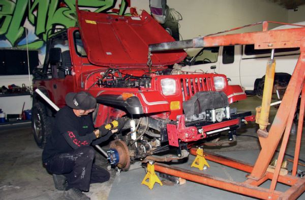 With the V-8 mocked into place, mounting position could be determined and preparation made to install new engine mounts. Time spent here is valuable to the final results. Engine placement can affect hood, radiator, and firewall clearance. Position may also affect drivetrain angle and ultimately driveshaft angles and clearances.
