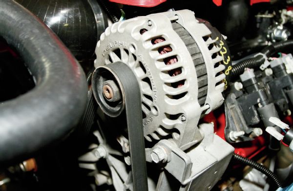 The factory GM alternator on the V-8 was retained and needed to be wired into the Jeep electrical system. The exciter wire for the alternator was built into the new harness. The main charge wire from the alternator was routed to the battery positive post, with a Maxi-Fuse used inline.