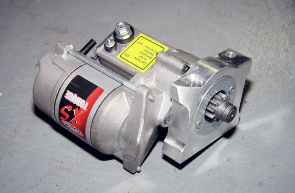 A compact Powermaster XS Torque starter was used for the swap. A corner of the starter flange had to be ground down some to clear the bellhousing. Wiring is straight-forward and the factory Jeep connections were all used on the new starter.
