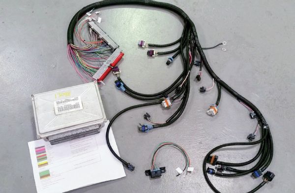 A custom swap harness was sourced from a local speed shop that specializes in swap harnesses. The engine control module (ECM) was also reprogrammed and set up to work with the manual transmission. LS harness work is now available from a variety of experienced sources, should you not have the time or inclination to tackle the engine control electrical yourself.
