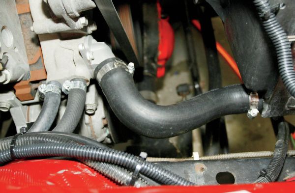 The lower radiator hose was found on the shelf at the local parts store. The heater outlets on the new engine were easily plumbed to the factory Jeep heater using generic heater hose.