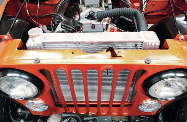 Flex-a-lite offers bolt-in radiator and fan combinations for over 40 years of Jeeps, covering JK, TJ, YJ, XJ and even most CJs. These are available with and without an electric fan. The fan comes attached to the radiator, saving you time, and is already matched in size and airflow for the specific application. Their radiators include patented side-tank design that transfers heat 135 percent better than aluminum sheetmetal side-tanks.